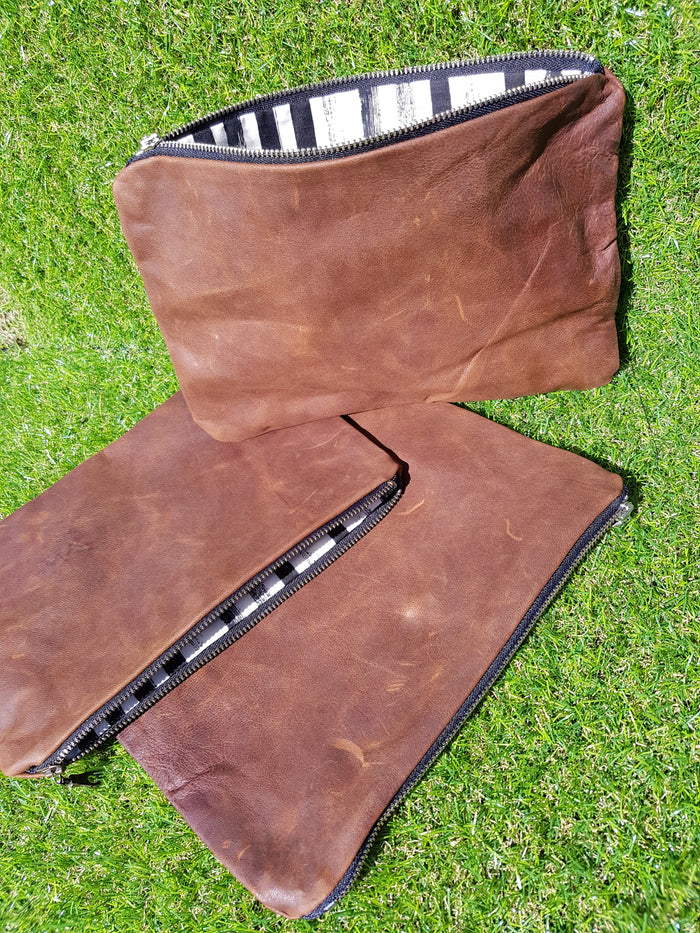 Men's Rugged leather clutch or bag